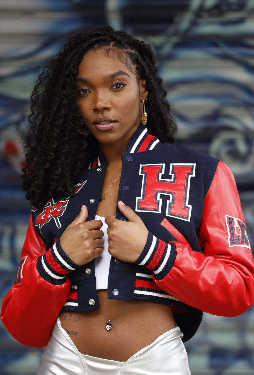 Girl wearing varsity outlet jacket